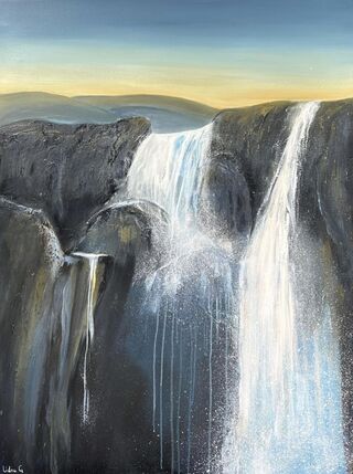 Under a blue sky tinged with a sunset sits large mountains in Paynes grey hues with a large waterfall in the centre and 1 smaller one on one side and a trickle of water on the other side.