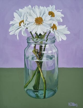 A glass jar filled with white daisies sits on a background split into two coloured sections - mauve on the top and a dark sage green on the bottom. The glass is reflecting light.