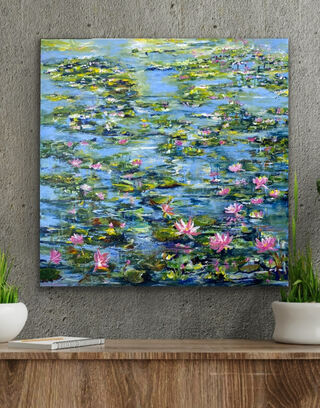 Softest pink flowers above the green leaves and soft blue water. There is energy and movement of the water and a sense of calm and rest. The water and lilies fade into the distance and the overall scene has a calming effect. 

Monet painted these over and over again and I can see why as they are just such a happy thing to capture and a timeless subject. 