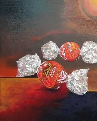 Realistic representation of 2 Lindt Lindor chocolates used as a metaphor for Tori Johnson and Katrina Dawson.