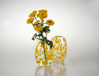 Tall, rounded clear glass vase with opaque yellow spots