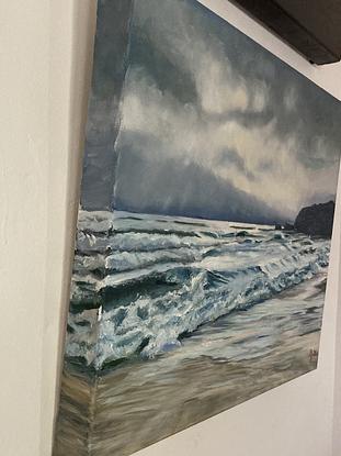 Stormy coastal surf and beach scene