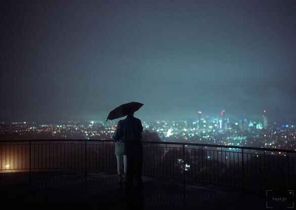 A couple looking over the city