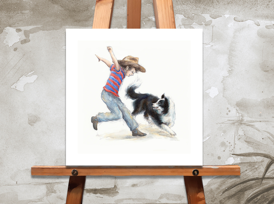 A boy running with his border collie.