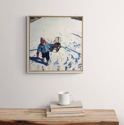 small child with sled in snow