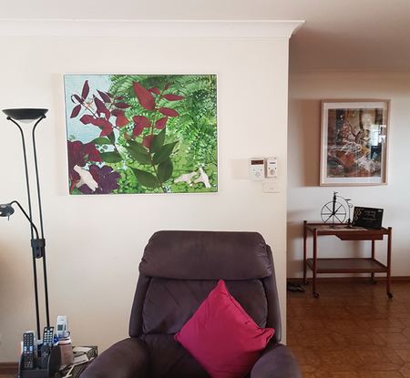 This artwork is designed to bring nature into your room, consisting of foliage, ferns and palms, flowers, a spider plus web sitting in amongst the foliage waiting for an insect to pass by, hence the name "Waiting for Lunch".  This is all surrounded with a white box frame offering a peaceful and calming effect on the wall.