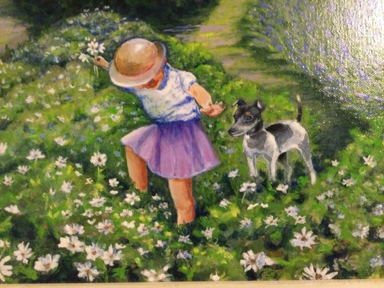 Child and dog in flower garden