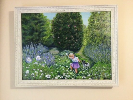 Child and dog in flower garden