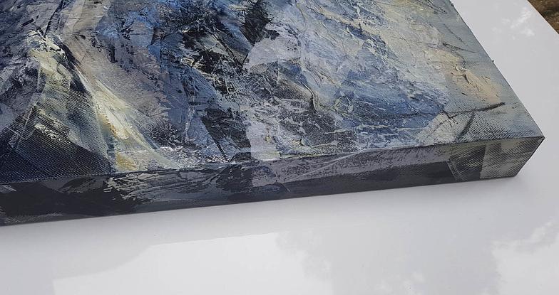 An abstract artwork that depicts the Victorian alps, painted with oils and mixed media. Soft shades of blue, silver, cream, white and grey.