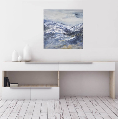 An abstract artwork that depicts the Victorian alps, painted with oils and mixed media. Soft shades of blue, silver, cream, white and grey.