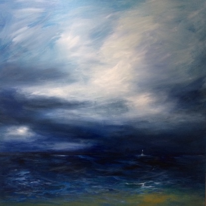 Large stormy clouds over a dark ocean dark nave blue white clouds white boat