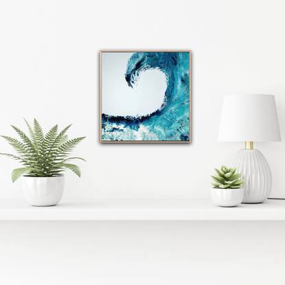 large ocean wave on blue sky background