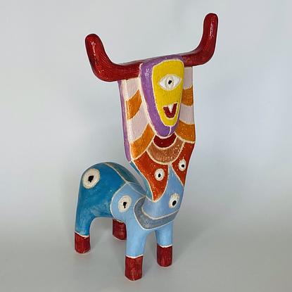 Brightly glazed ceramic minotaur. Most unusual piece.