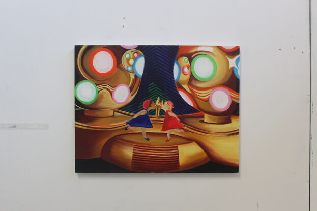 Cropped painting of a metallic party light focusing on dancing figurines