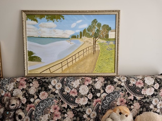 This is a seascape oil painting of Golden Beach in Queensland. With its gentle waters lapping on the sandy beach. The many clouds in the spring sky threatening yet another spring storm. The fence in the foreground drawing  attention to the distance daring the viewer to use their imagination to stroll for a while. The gentle pastel colours used genuinely picture the spring day on this amazing beach.  The darker colors used for the trees drifting off into the distance again draw the attention off and away. The gold ornate frame truly adds to the value of this one-of-a-kind seascape oil painting.