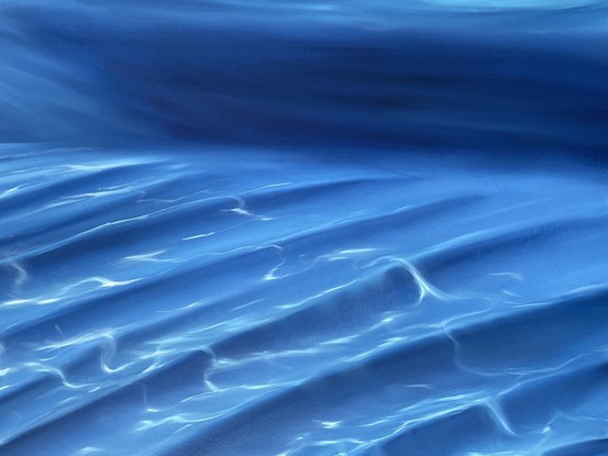 tropical underwater sand ripples and water surface