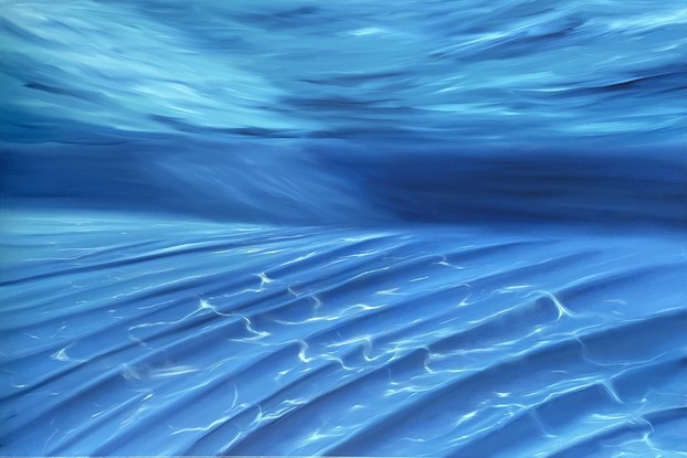 tropical underwater sand ripples and water surface