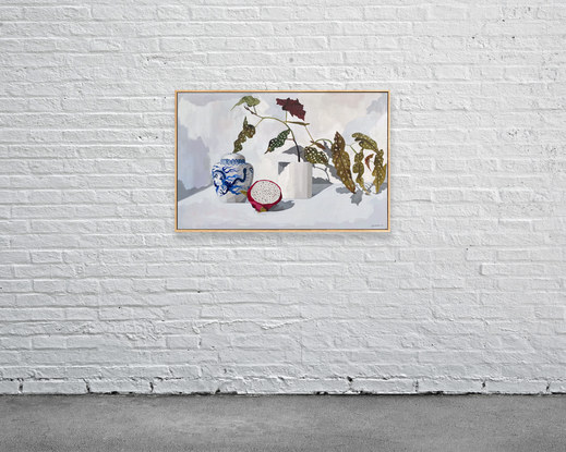 Chinese blue and white Ginger Jar, Dragon fruit and house plant arranged on a white background.