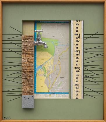 Made up of collage, found objects, timber and paint. The work involves accurate wood working and has an integral frame.