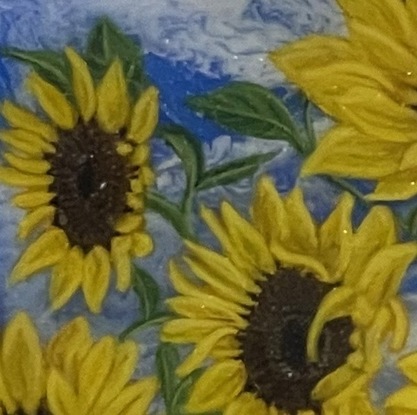 Sunflowers on a sky blue background in a floating Tassie oak frame.