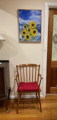 Sunflowers on a sky blue background in a floating Tassie oak frame.