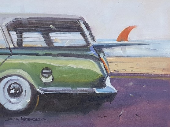 Nostalgic surf culture. A 19602 Valiant sits ready to head off to the beach for a fun day of surfing
