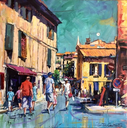 French town of Bergerac with people walking in the street. 