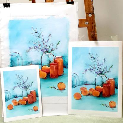 Modern simple style still life of apricots with rosemary sprigs, jam jars on outdoor table with turquoise blue sky.