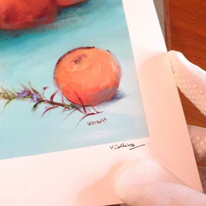 Modern simple style still life of apricots with rosemary sprigs, jam jars on outdoor table with turquoise blue sky.