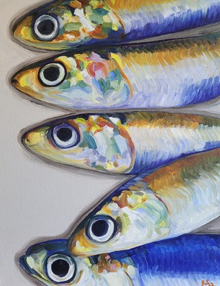 A row of rainbow anchovy heads.