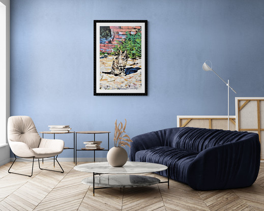 A portrait orientation canvas depicting a lone tabby cat standing  amongst the Roman ruins, in a sturdy black floating frame.