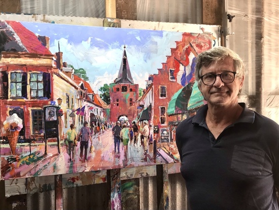 Town of Elburg in the Netherlands with people walking towards the entrance gate. 