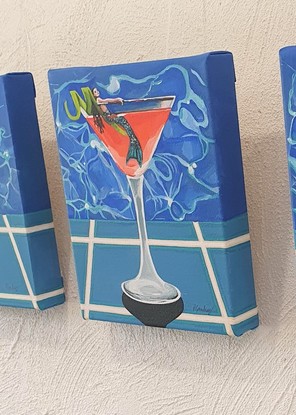 Mermaid in a Cosmopolitan Cocktail Glass