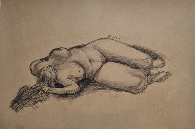 Two landscape sketches of a woman in reclining pose