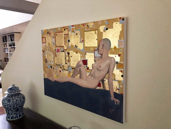 A reclining nude female on a coloured mosaic patterned background of acrylic and gold leaf.