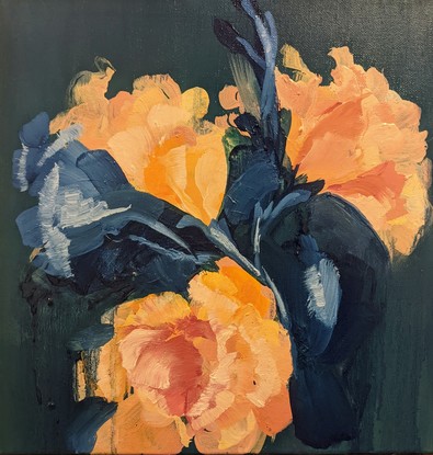 Vibrant yellow roses against a background of dark green