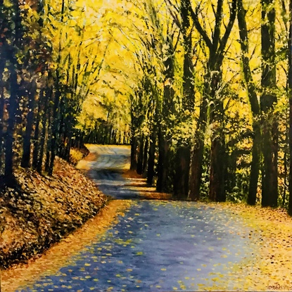 Road of Autumn trees leading  the eye into the distance