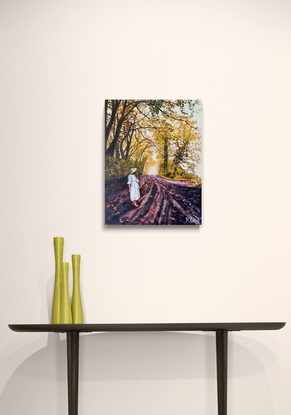 Autumn scene with woman walking along road 