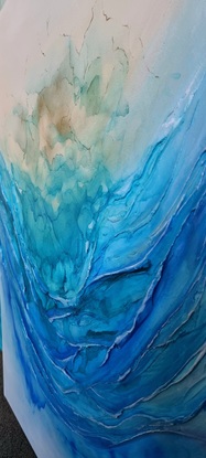 Abstract and textured with blue ripples giving the impression of waves.