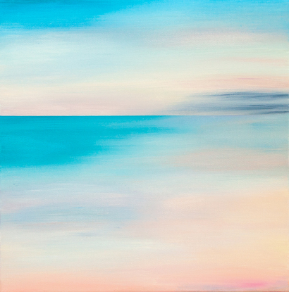 View over ocean with pale pink and blue hues.