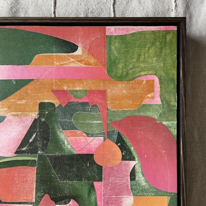 Square canvas board with paper collage in pink and green blocks of colour in abstract shapes. 