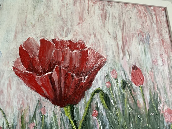 Semi abstract field of red poppies on a blue, red and white background. The poppies have been layer down thickly with  a pallet knife 