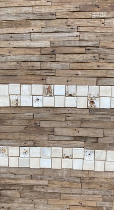 Reclaimed wood, cut up and arranged horizontally