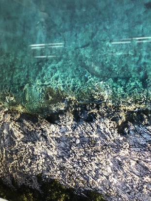 Aerial view of rocky coastline and ocean