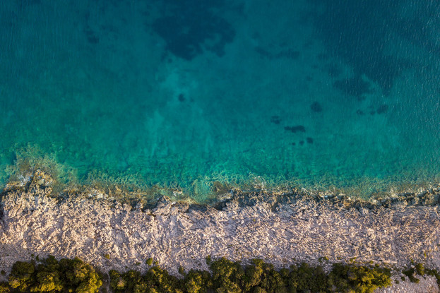 Aerial view of rocky coastline and ocean