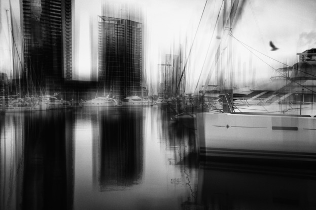 River Rhythm. Movement in the camera along with structural noise creates a rich textural image of Docklands, Melbourne. = Printed on archival standard METALLIC surface photographic paper and available as a Limited Edition of 21 prints. From the body of work - ‘ordinary interesting Kinetic City’.