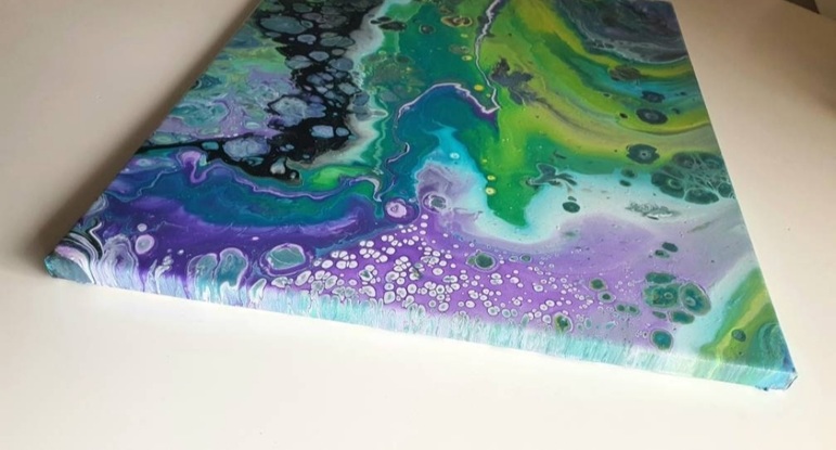 This colorful fluid art evokes the beauty of the underwater world and coral seas.