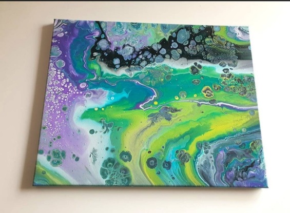 This colorful fluid art evokes the beauty of the underwater world and coral seas.