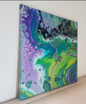 This colorful fluid art evokes the beauty of the underwater world and coral seas.