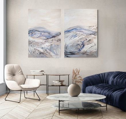 A large abstract landscape of the Victorian Alpine region in mixed media in pale blue, cream, beige and grey.